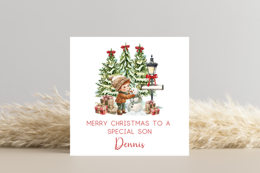 Personalised Snowman Building Little Boy Christmas Card