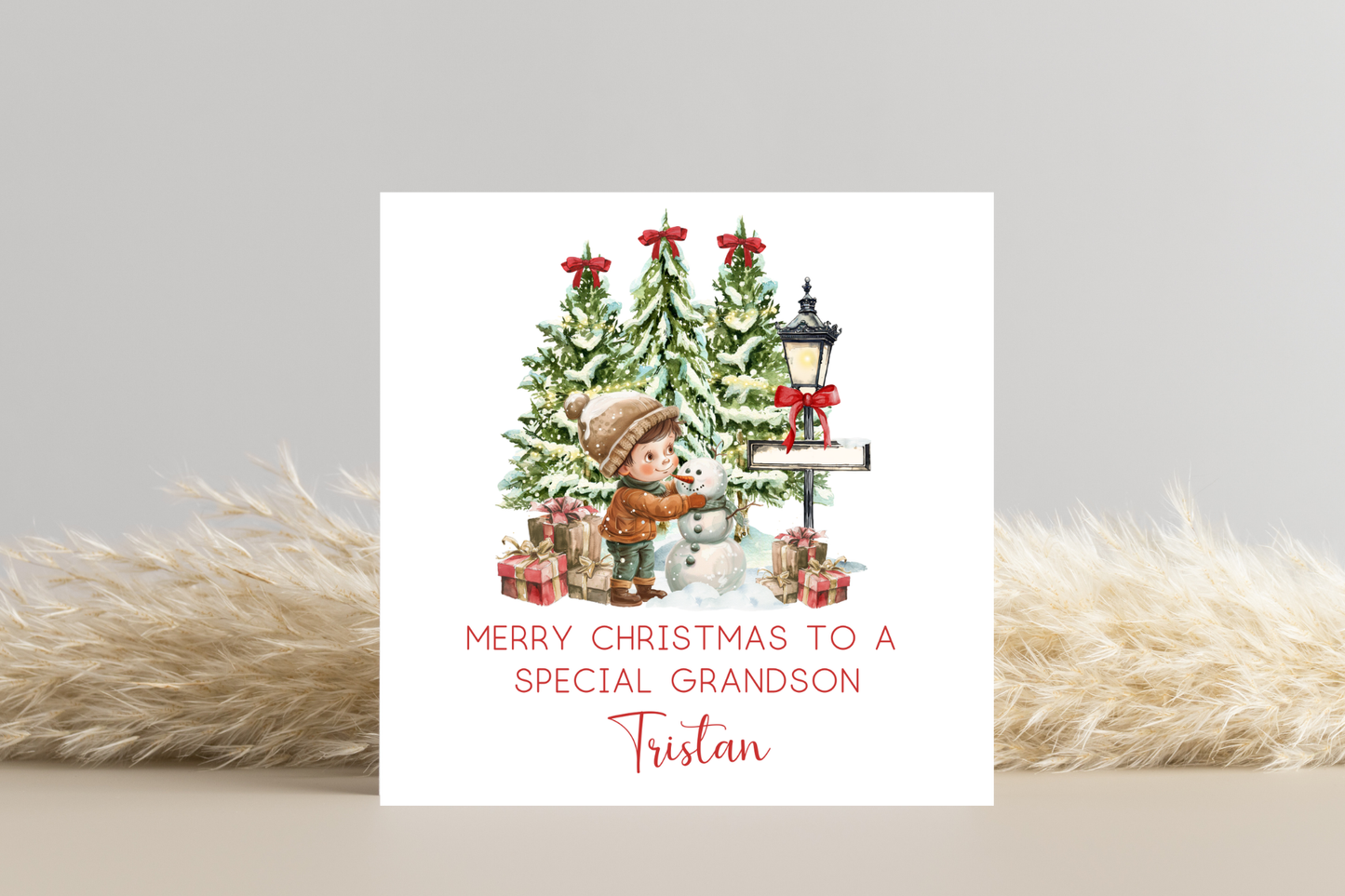 Personalised Snowman Building Little Boy Christmas Card