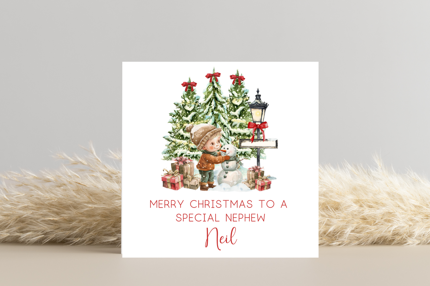 Personalised Snowman Building Little Boy Christmas Card