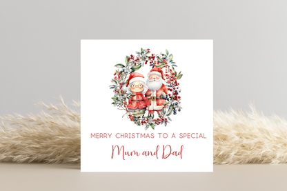 Personalised Santa and Mrs Claus in Wreath Christmas Card